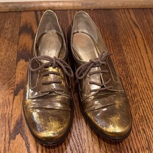 Pour La Victoire Metallic Gold and Brown Loafers